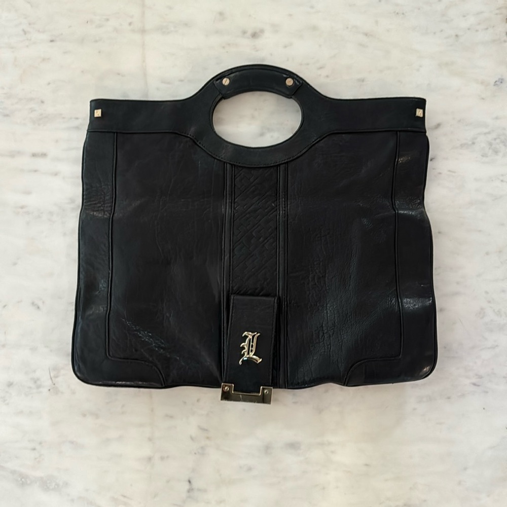 LAMB by Gwen Stefani, black leather fold over clutch